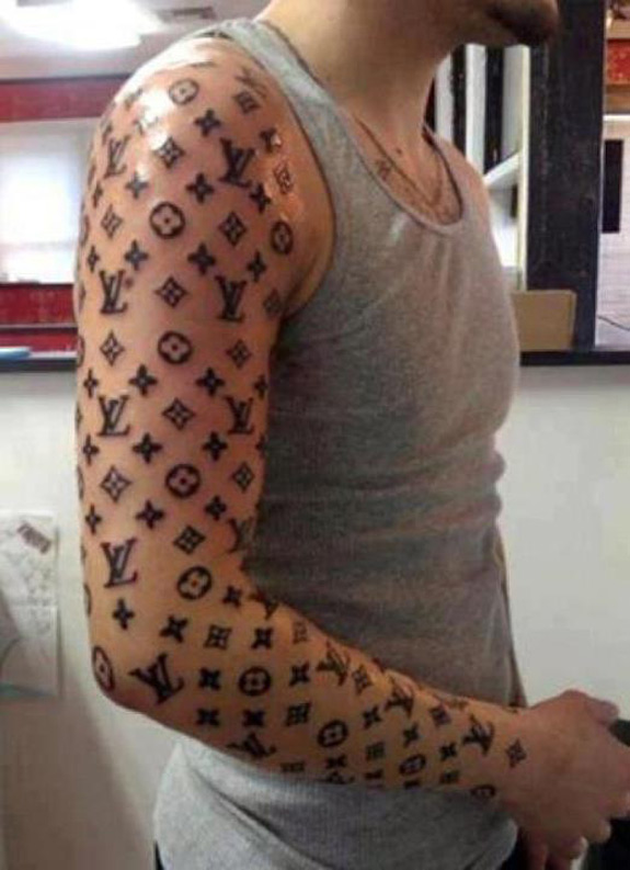 In Ridiculous Tattoo News Louis Vuitton One Arm Sleeve FAIL Photo 