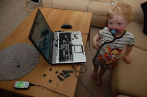 Caption This A Curious Baby A Computer